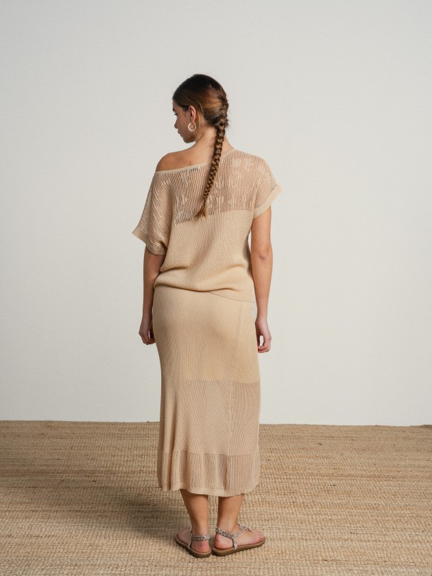 Long skirt in fine knit fabric with sheer details.