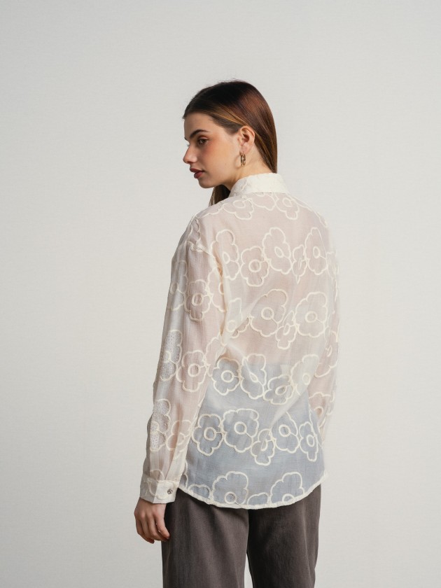 Embroidered shirt with flowers and sequins, with a sheer fin Embroidered shirt with flowers and sequins, with a sheer fin