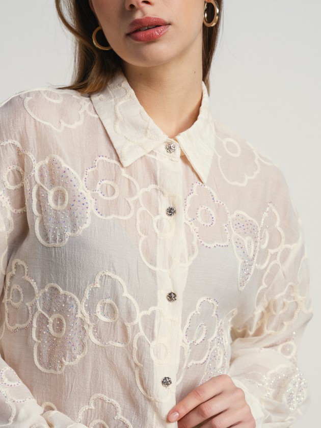 Embroidered shirt with flowers and sequins, with a sheer fin Embroidered shirt with flowers and sequins, with a sheer fin