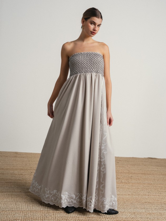 Long strapless dress with embroidery. Long strapless dress with embroidery.