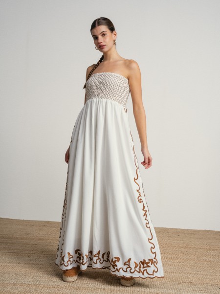 Long strapless dress with embroidery.