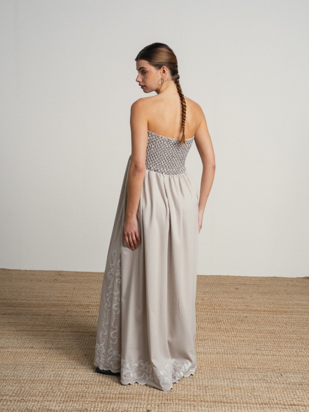Long strapless dress with embroidery. Long strapless dress with embroidery.
