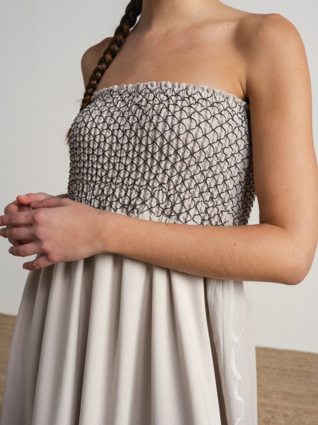 Long strapless dress with embroidery. Long strapless dress with embroidery.