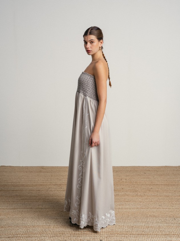 Long strapless dress with embroidery. Long strapless dress with embroidery.