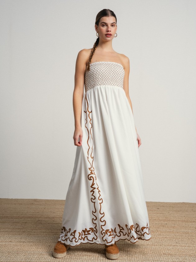 Long strapless dress with embroidery.