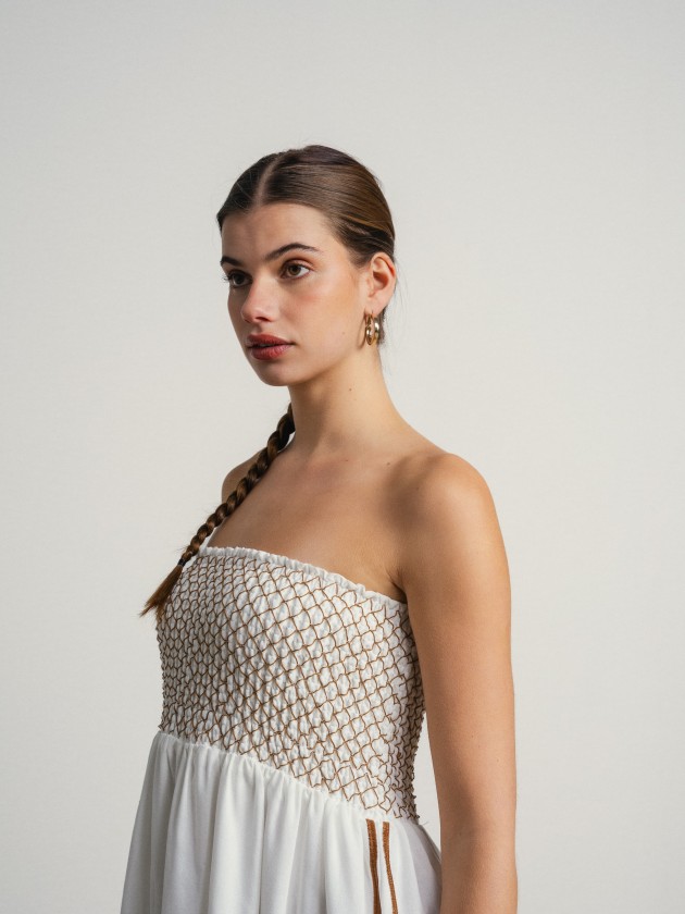 Long strapless dress with embroidery.