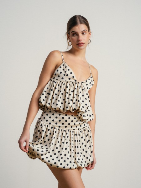 V-neck top with balloon polka dots.
