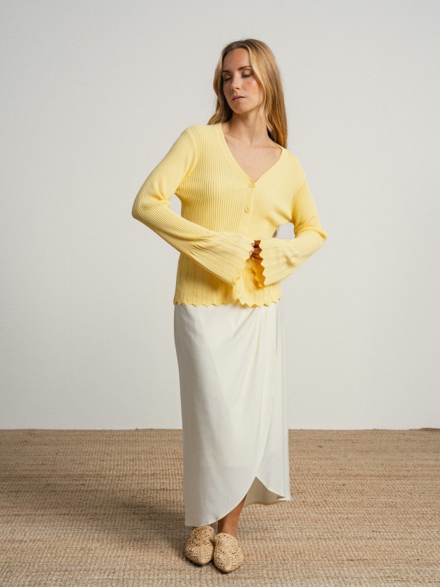 Knitted jacket with ruffles on the sleeves Knitted jacket with ruffles on the sleeves