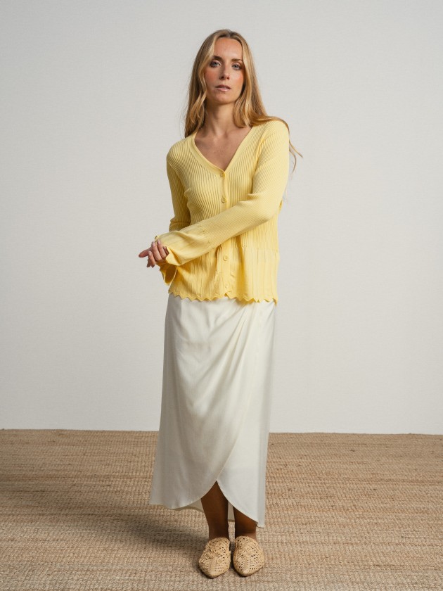 Knitted jacket with ruffles on the sleeves Knitted jacket with ruffles on the sleeves