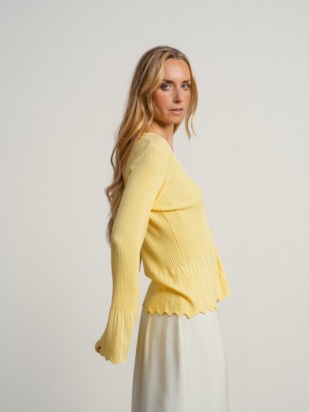 Knitted jacket with ruffles on the sleeves Knitted jacket with ruffles on the sleeves