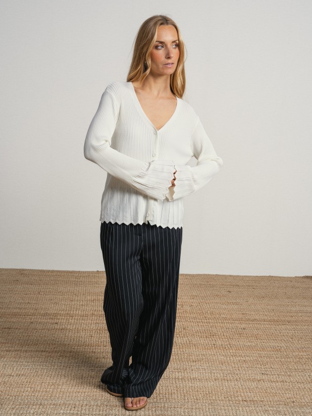Knitted jacket with ruffles on the sleeves Knitted jacket with ruffles on the sleeves