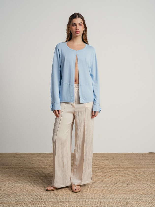 Knitted cardigan with bow on the sleeves Knitted cardigan with bow on the sleeves