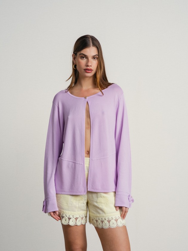 Knitted cardigan with bow on the sleeves Knitted cardigan with bow on the sleeves