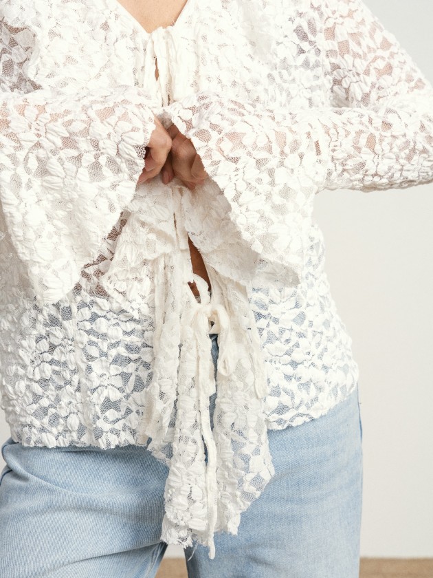 Coat with lace and bows