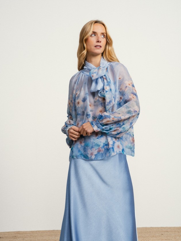 Blouse with flowers and a bow