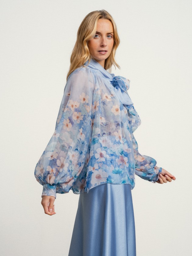 Blouse with flowers and a bow