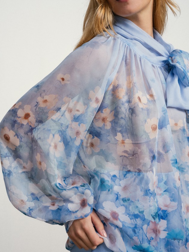 Blouse with flowers and a bow