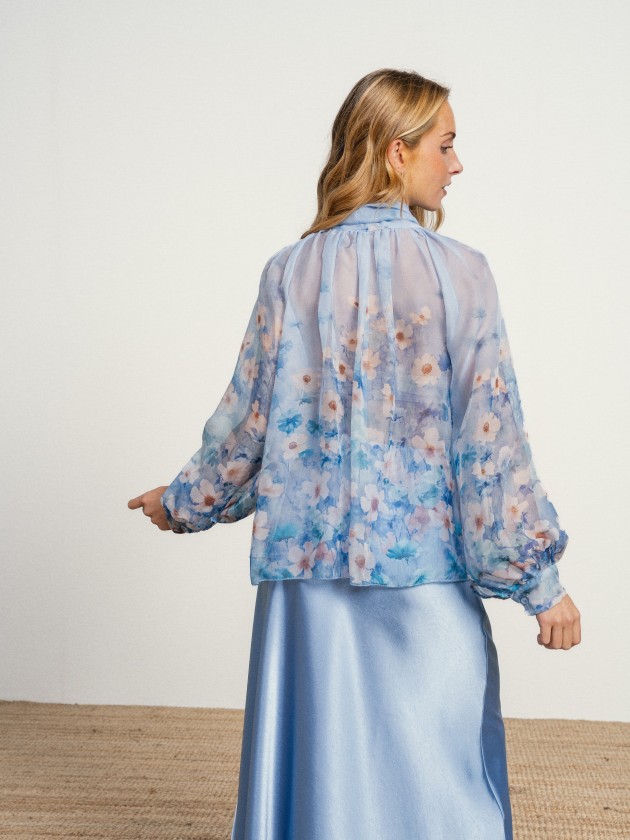 Blouse with flowers and a bow