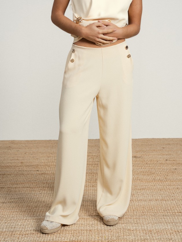 Wide-legged trousers with silver buttons