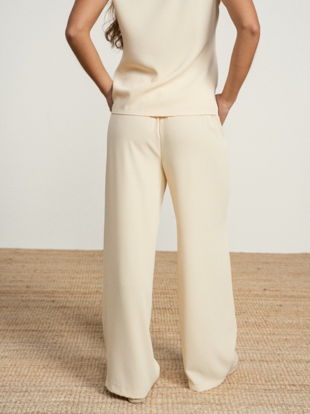 Wide-legged trousers with silver buttons