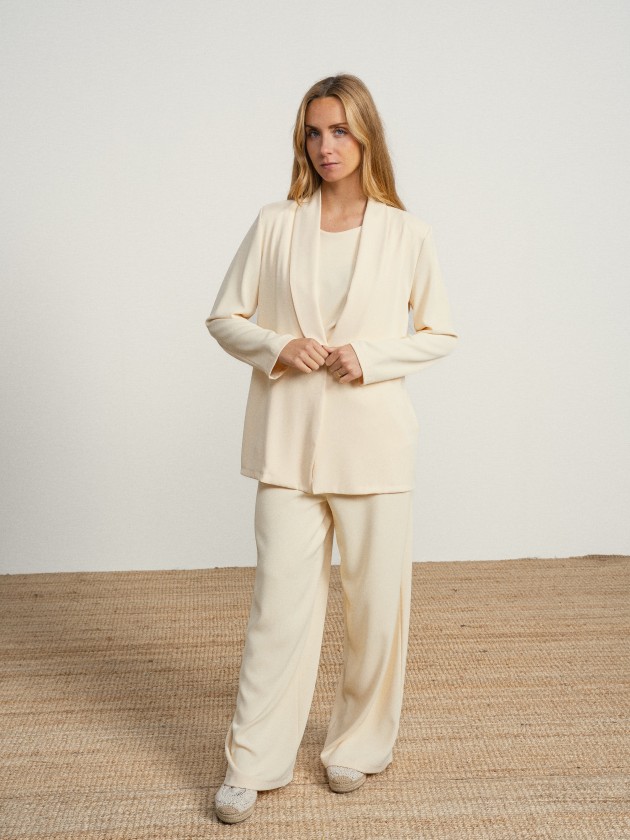 Coat with gold button Coat with gold button