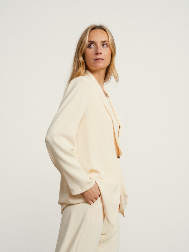 Coat with gold button Coat with gold button