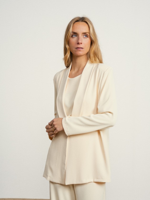 Coat with gold button Coat with gold button