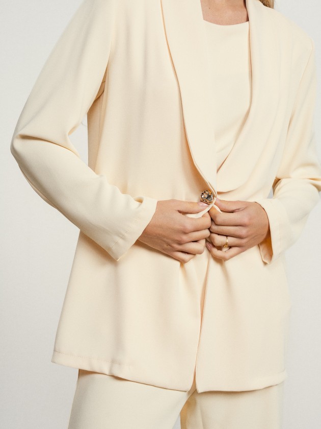 Coat with gold button Coat with gold button