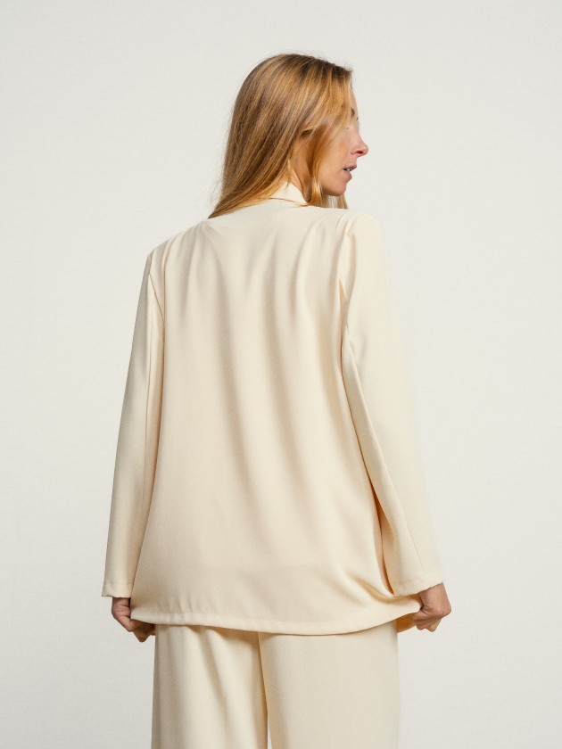 Coat with gold button Coat with gold button