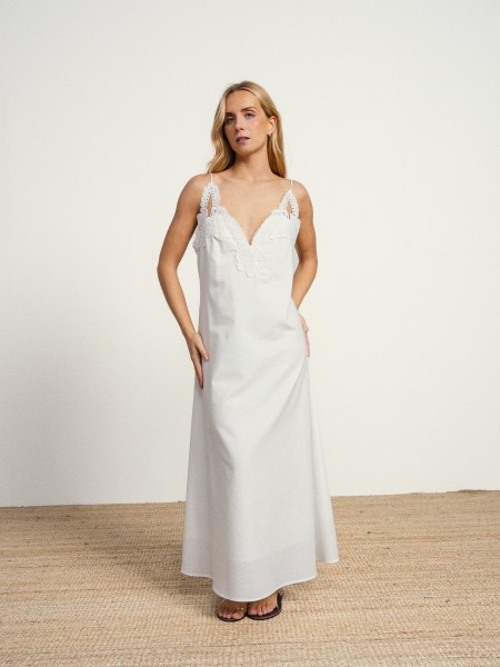 Long cotton dress with a v-neck and english embroidery.