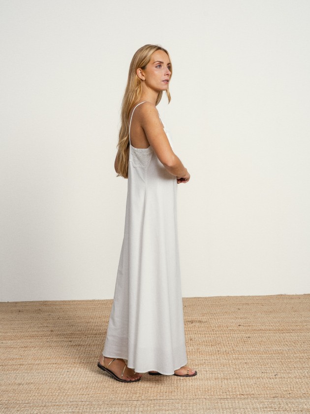 Long cotton dress with a v-neck and english embroidery. Long cotton dress with a v-neck and english embroidery.