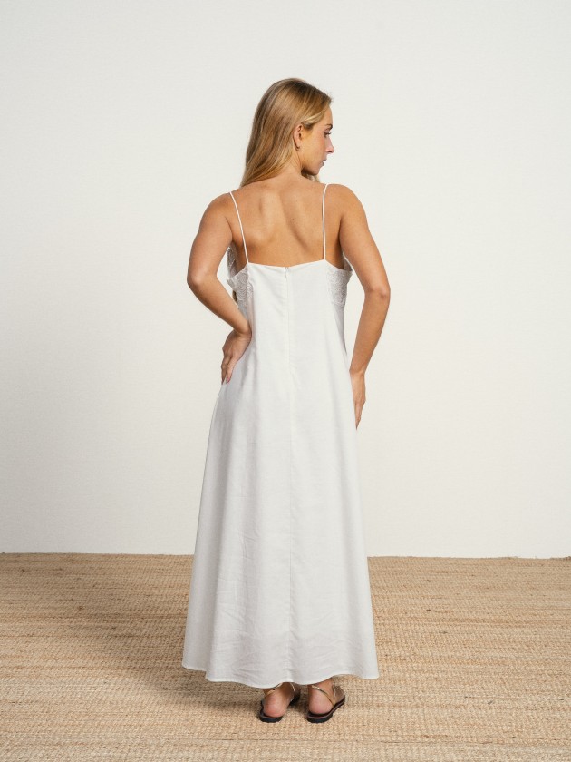 Long cotton dress with a v-neck and english embroidery. Long cotton dress with a v-neck and english embroidery.