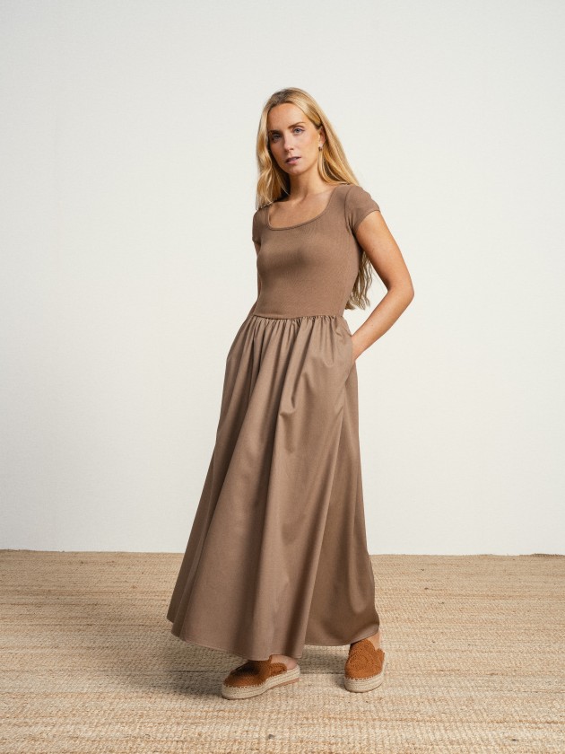 Long dress with a square neckline. Long dress with a square neckline.