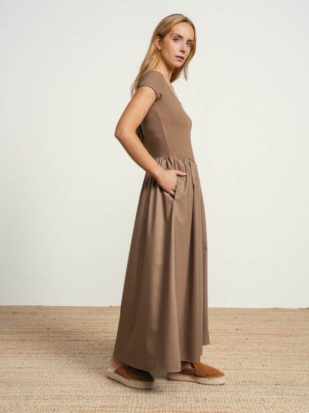 Long dress with a square neckline. Long dress with a square neckline.