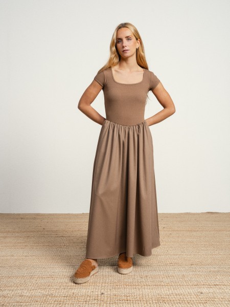 Long dress with a square neckline.