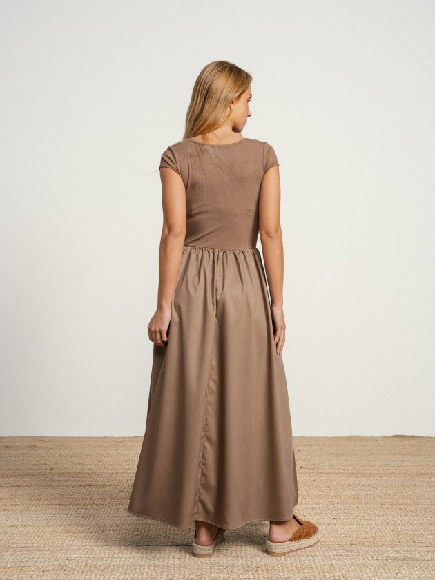 Long dress with a square neckline. Long dress with a square neckline.