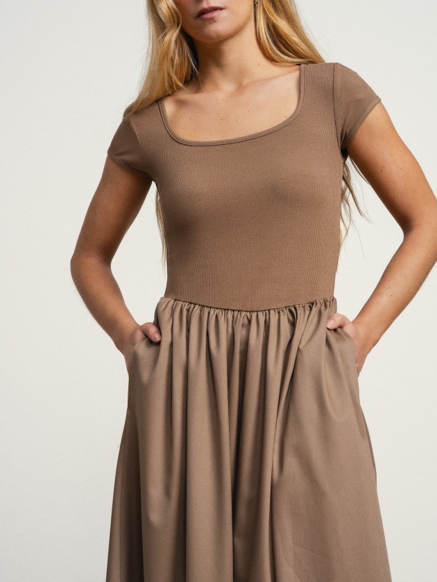 Long dress with a square neckline. Long dress with a square neckline.