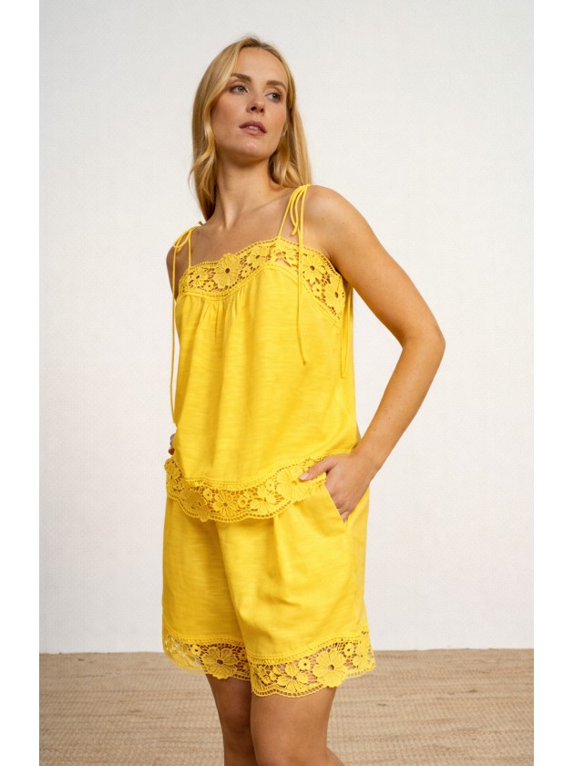 Cotton tank top with thin straps and english embroidery. Cotton tank top with thin straps and english embroidery.