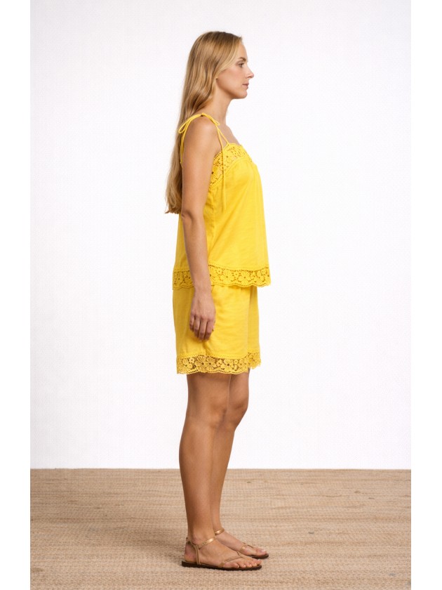 Cotton tank top with thin straps and english embroidery. Cotton tank top with thin straps and english embroidery.