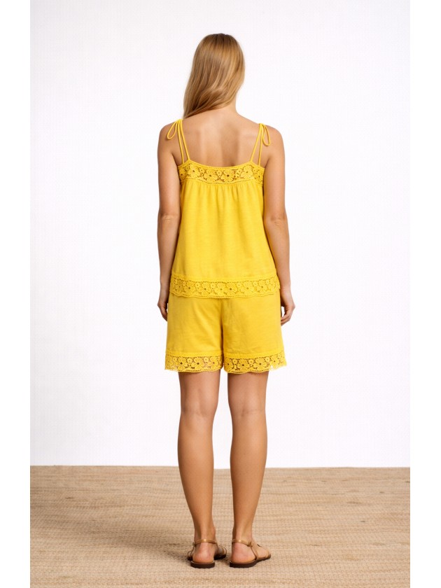 Cotton tank top with thin straps and english embroidery. Cotton tank top with thin straps and english embroidery.