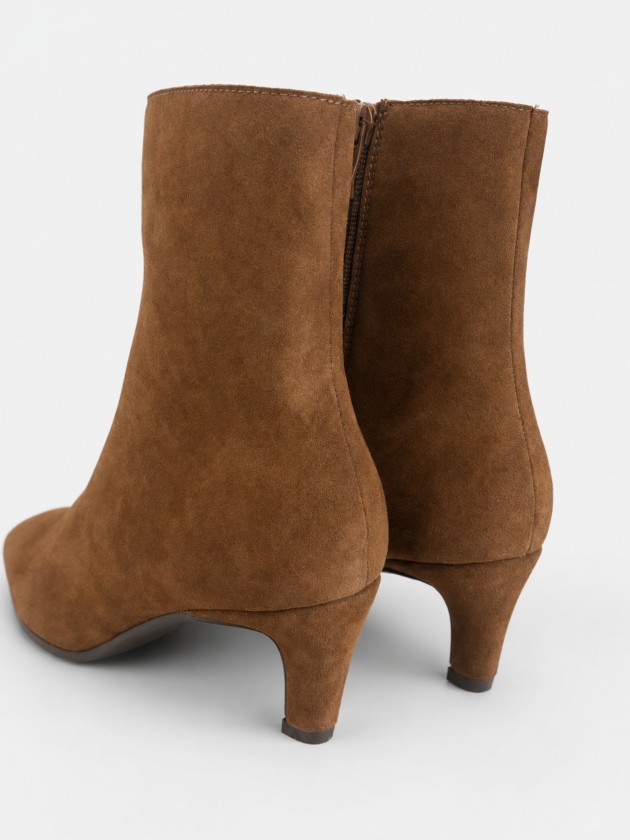 Botas de salto em pele Botas de salto em pele