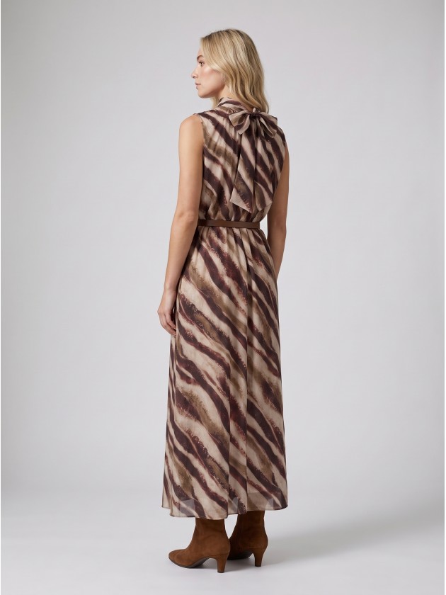 Long printed dress with belt. Long printed dress with belt.