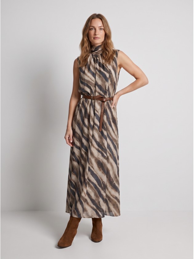 Long printed dress with belt. Long printed dress with belt.