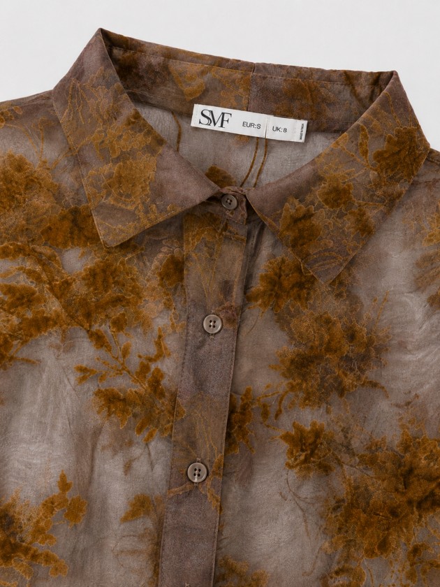 Semi-sheer shirt with floral print Semi-sheer shirt with floral print