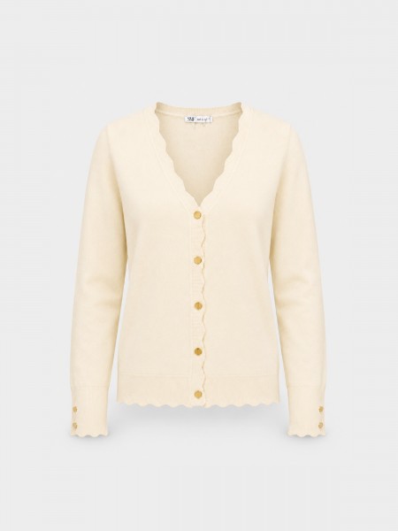 Veste tricot�e � finition ondul�e.