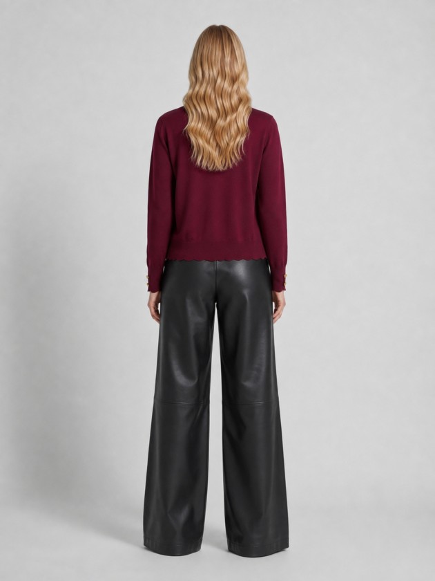 Knitted jacket with a wavy finish. Knitted jacket with a wavy finish.