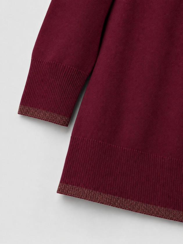 Knitted sweater with a v-neck