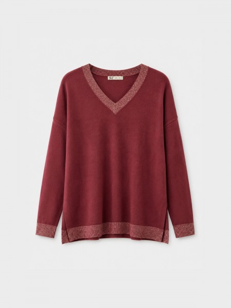 Knitted sweater with a v-neck