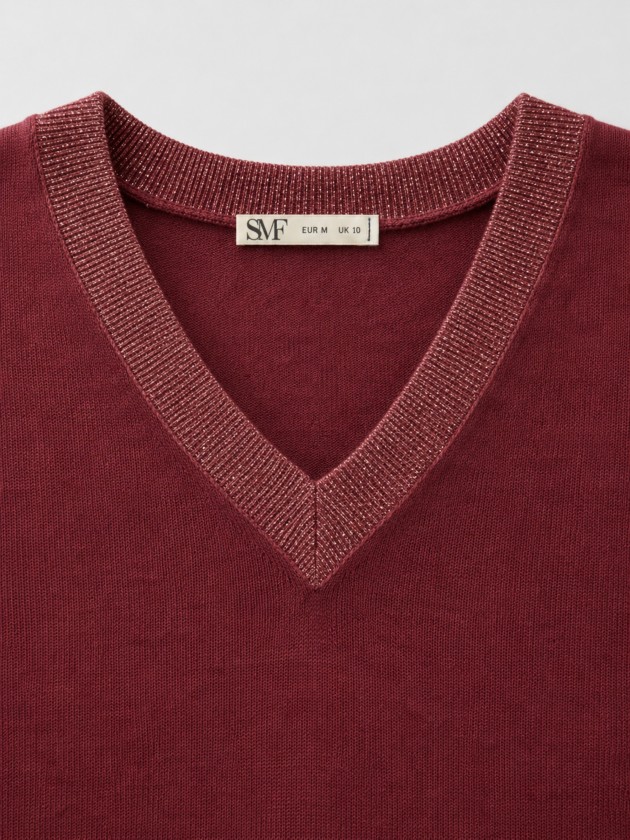 Knitted sweater with a v-neck