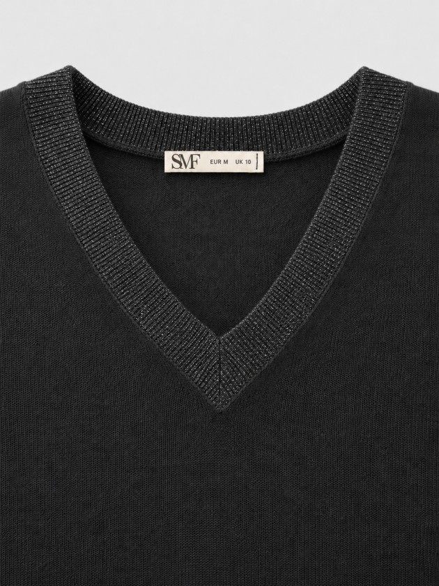 Knitted sweater with a v-neck